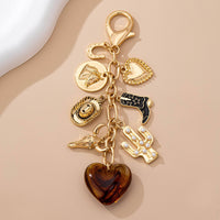 WESTERN HEART CROSS HAT BOOT HEART BAG CHARM